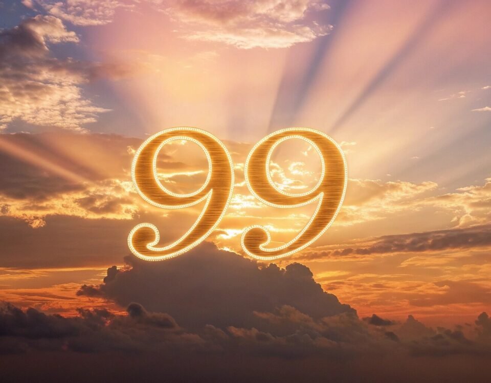 A golden "99" glowing in the sky at sunset, symbolizing divine guidance and the meaning of angel number 99.